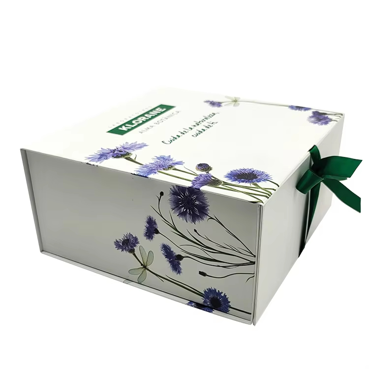 Custom-printed clothing delivered in paper gift boxes